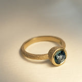 Entwine Still – Textured Round Pastel Green Sapphire Ring in 9ct Yellow Gold